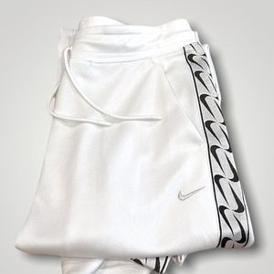 Womens nike swoosh pants. Medium